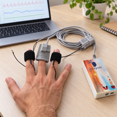 Dispositivo de biorretroalimentación profesional con 5 sensores y conectividad Bluetooth para uso clínico y doméstico.
